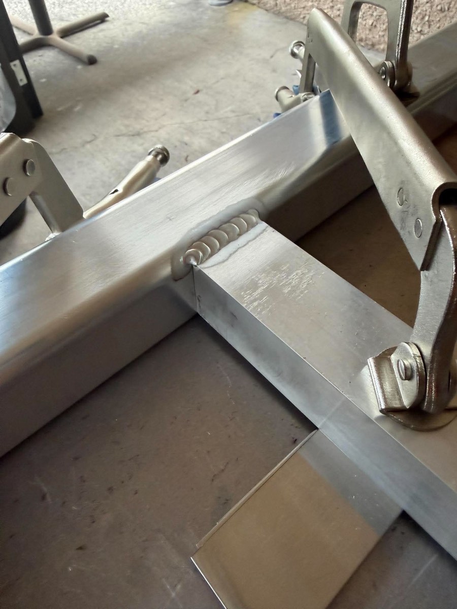 TIG weld bead on an aluminum security gate frame
