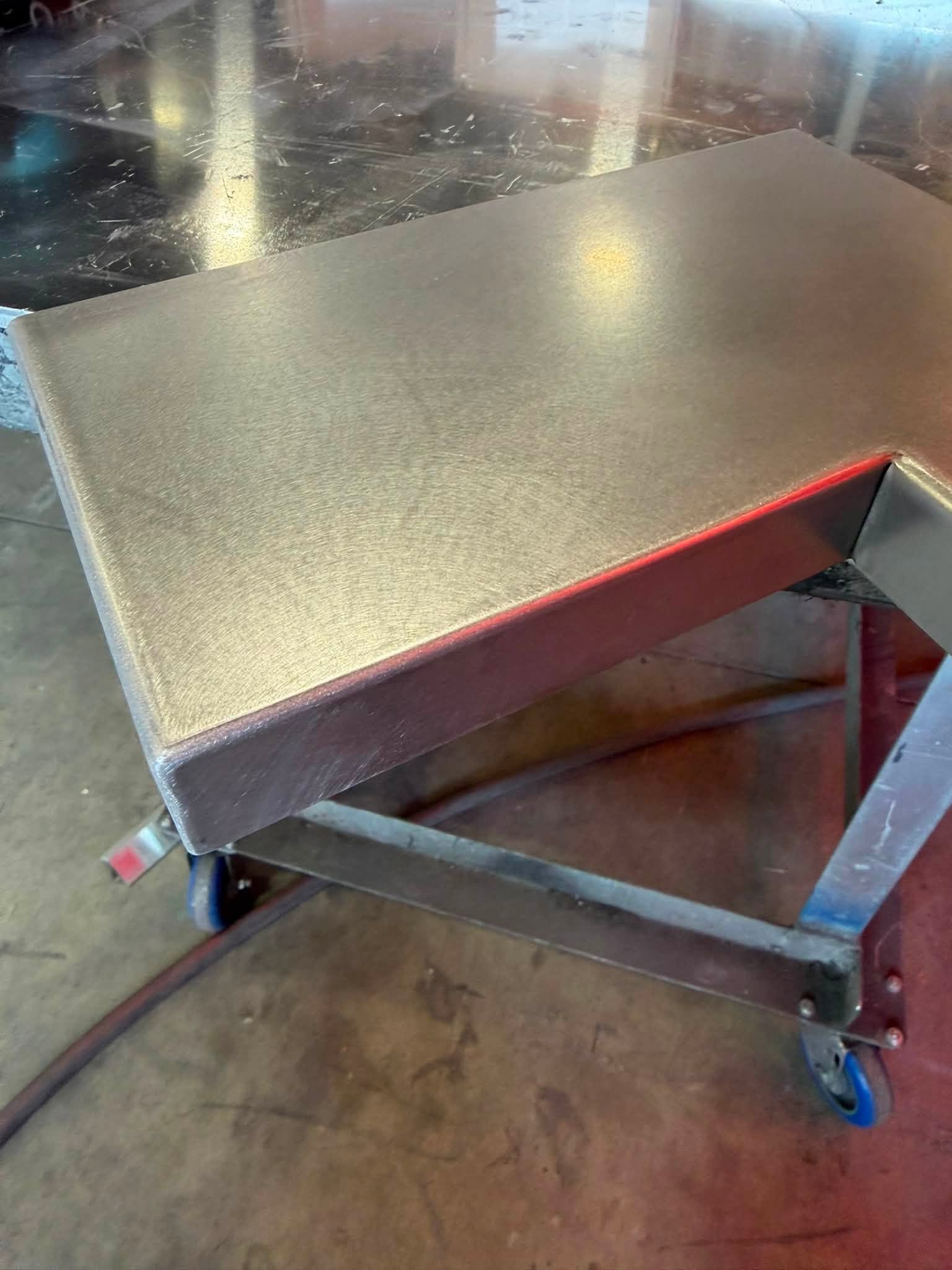 Orbital-sanded stainless steel cladding