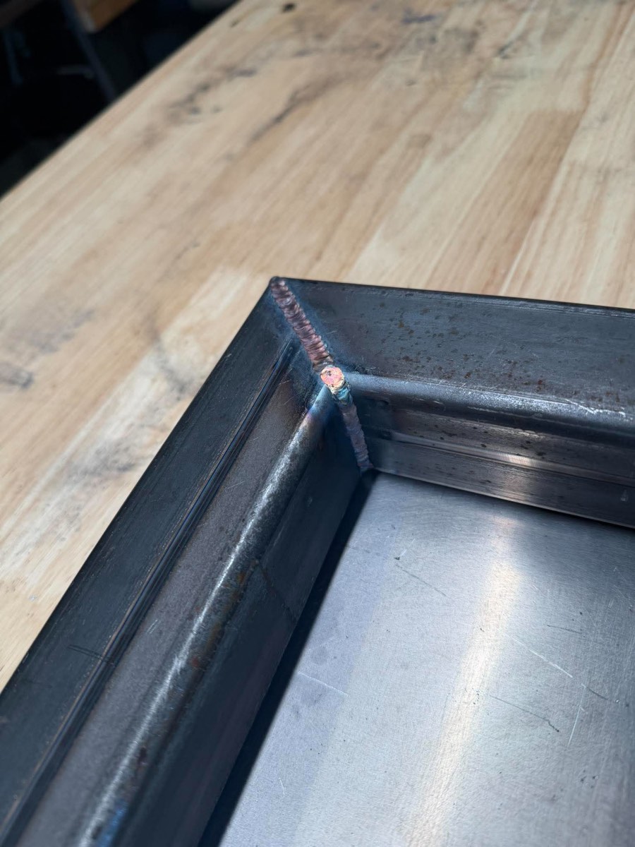 Stacked weld bead at the corner of a formed steel section